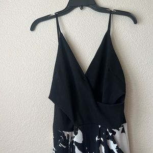 Floral legged, pant suit romper. Spaghetti strap.